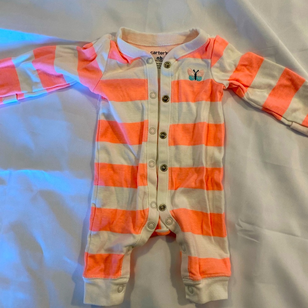 Carter newborn Jammie’s Bright orange and whit stripe